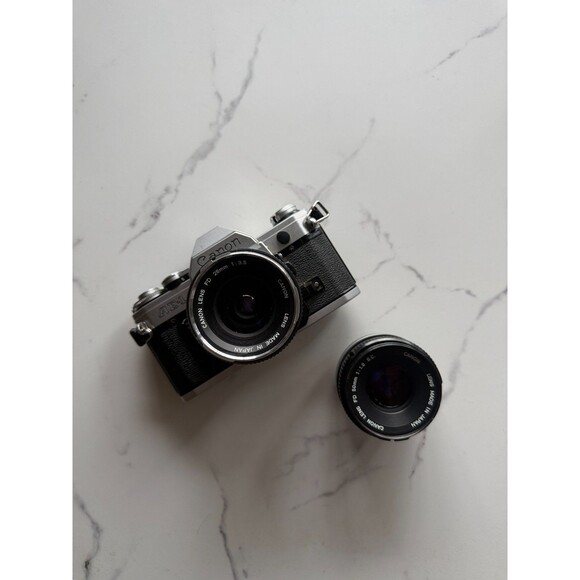 Canon AE-1 35mm Silver SLR Camera with 28mm 3.5 & 50 mm 1.8 Lens Two lenses